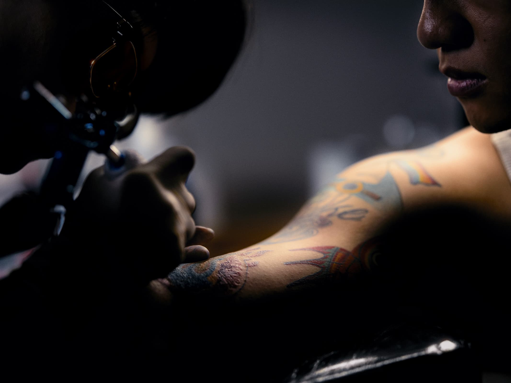 Minimalist tattoo workspace with organised booking flow